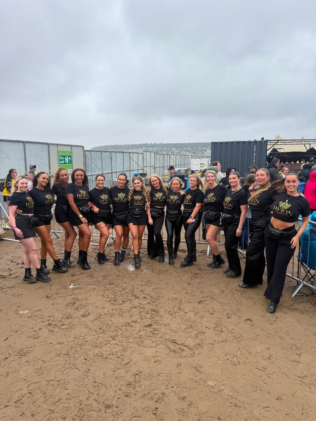 Reign Promotions team on the beach at a festival