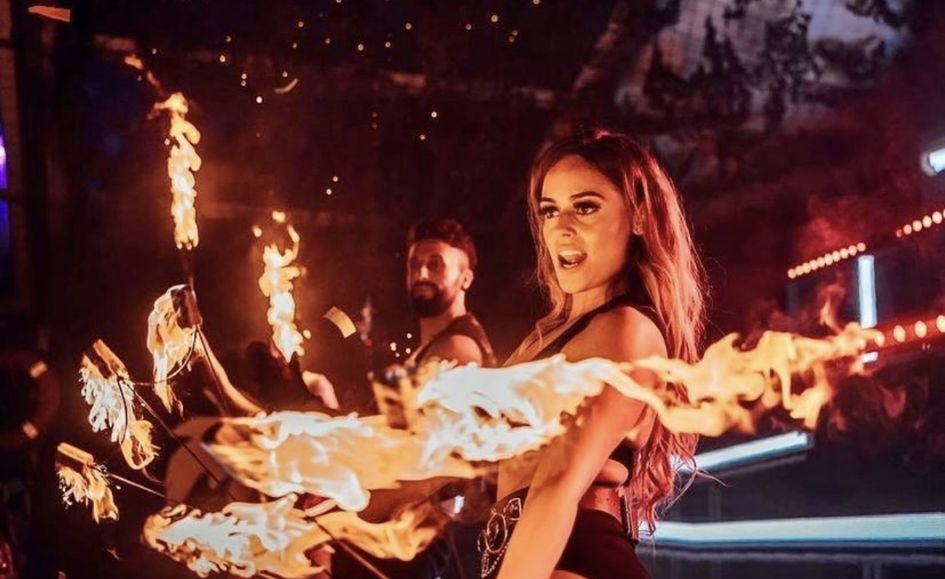 Reign fire performer at a festival